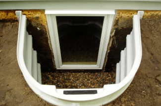 Egress window design for basement safety and ventilation