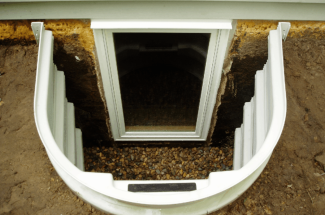 Egress window design for basement safety and ventilation