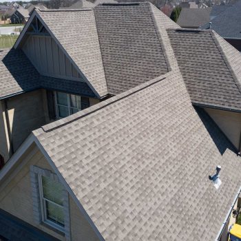 Residential,Shingle,Roof,Using,Ridge,Vent,S,With,Gables,Visible Completed residential shingle roof replacement on a Chicago home by Midwest Windows