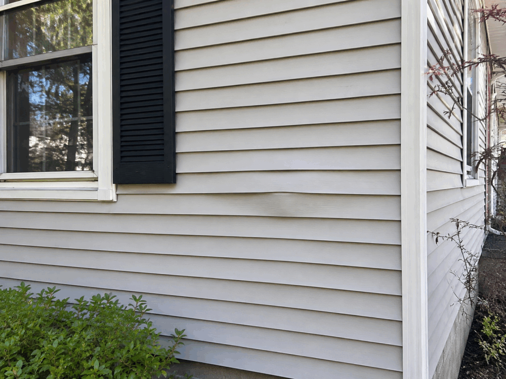 Slightly warped siding on a Chicagoland home.
