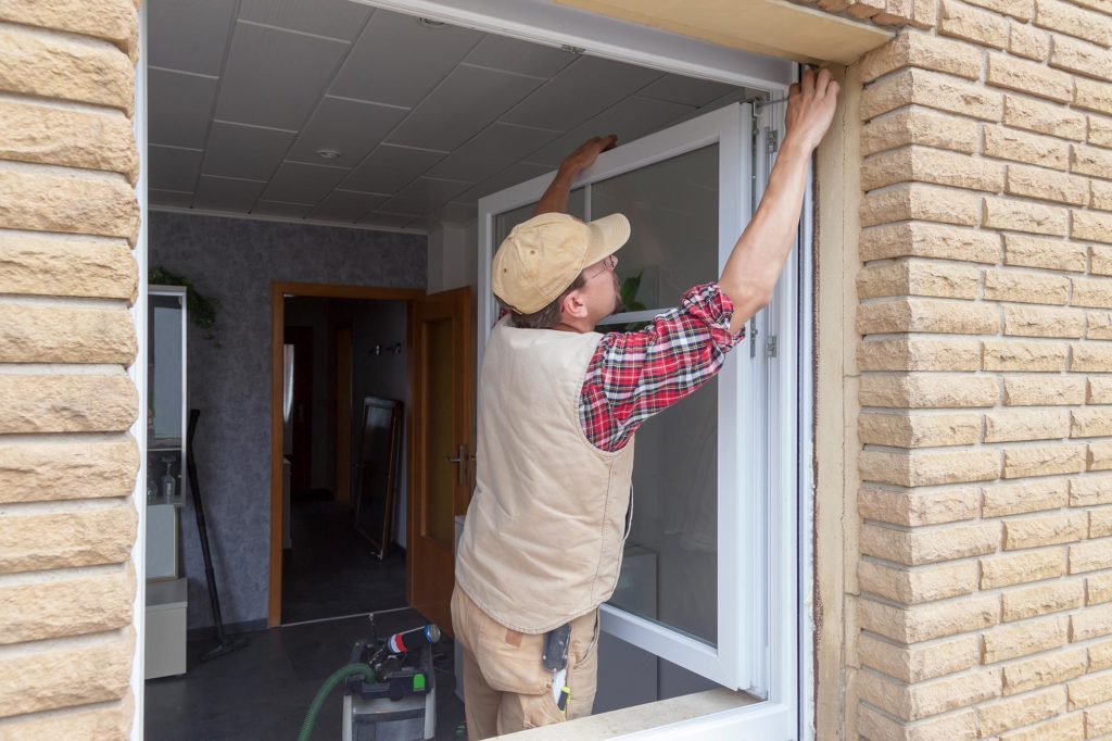 A Window Contractor replacing windows on a Chicago Home by Midwest Windows